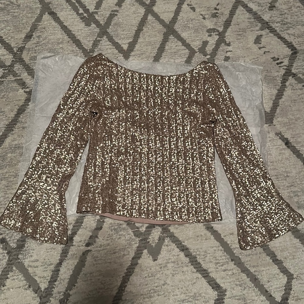 New sparkling woman shirt with bell sleeves